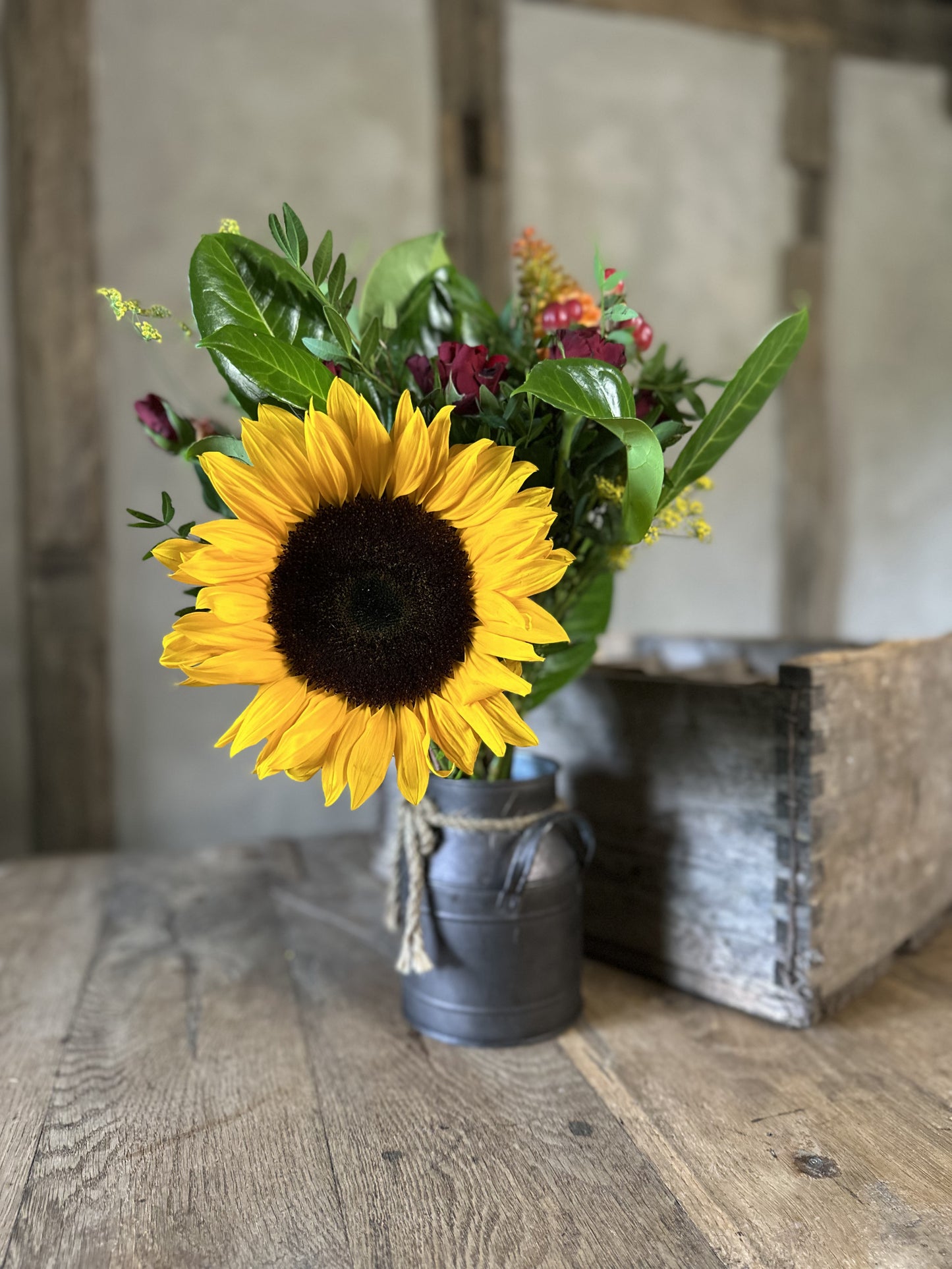 Bouquet with a sunflower in a rustic setting
